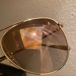 Beautiful Burberry glasses with logo print lenses
